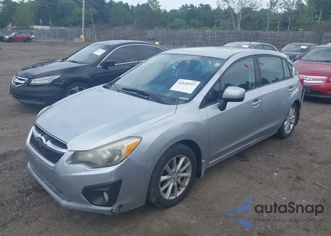 2012 Subaru Impreza 2.0I Premium z USA, uszkodzony, nr VIN JF1GPAC67CH216875